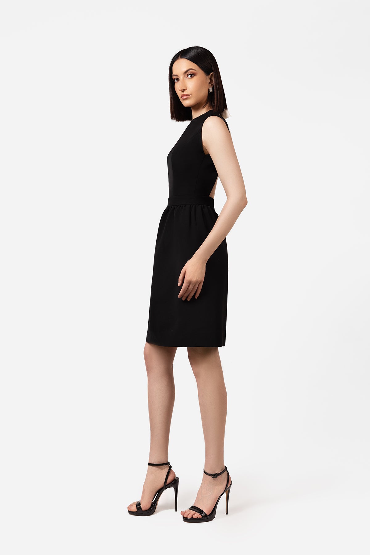 Black Sleeveless Mini Dress with Open Back and Contrast Bow