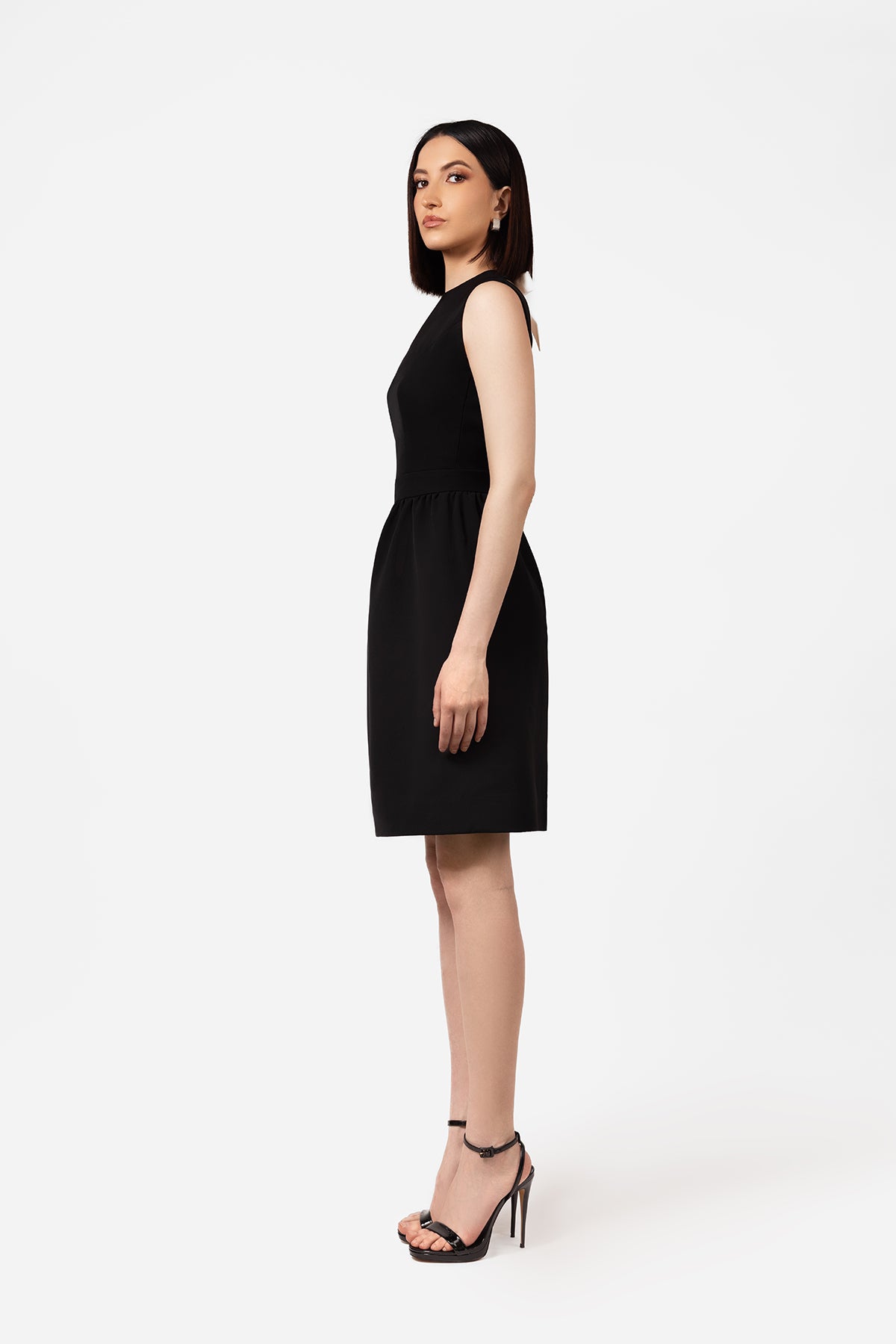 Black Sleeveless Mini Dress with Open Back and Contrast Bow