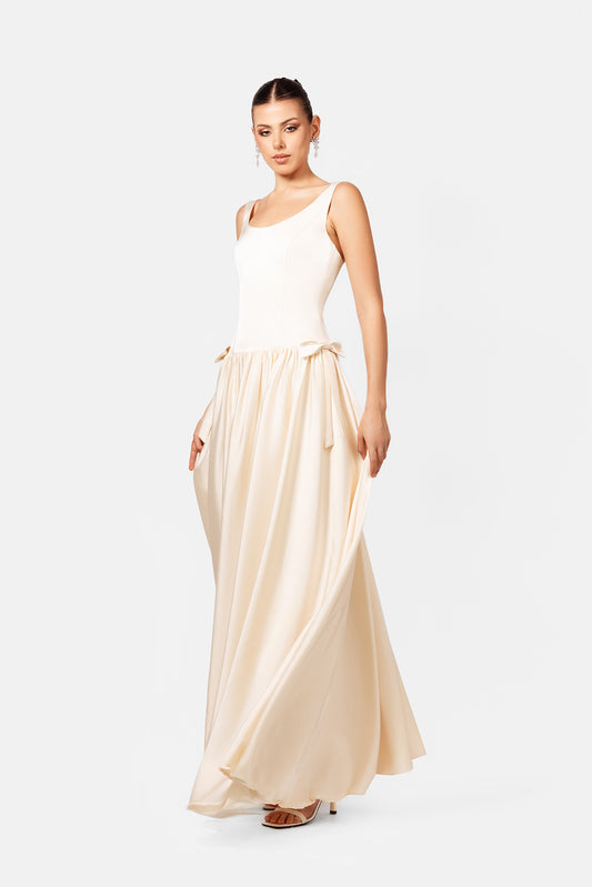 Ivory Sleeveless Maxi Dress with Gathered Waist and Flowing Skirt